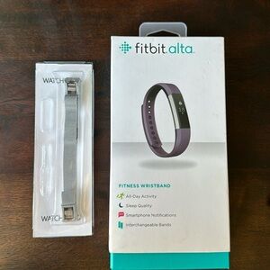 Brand New in box Fit Bit Alta with extra chain strap.